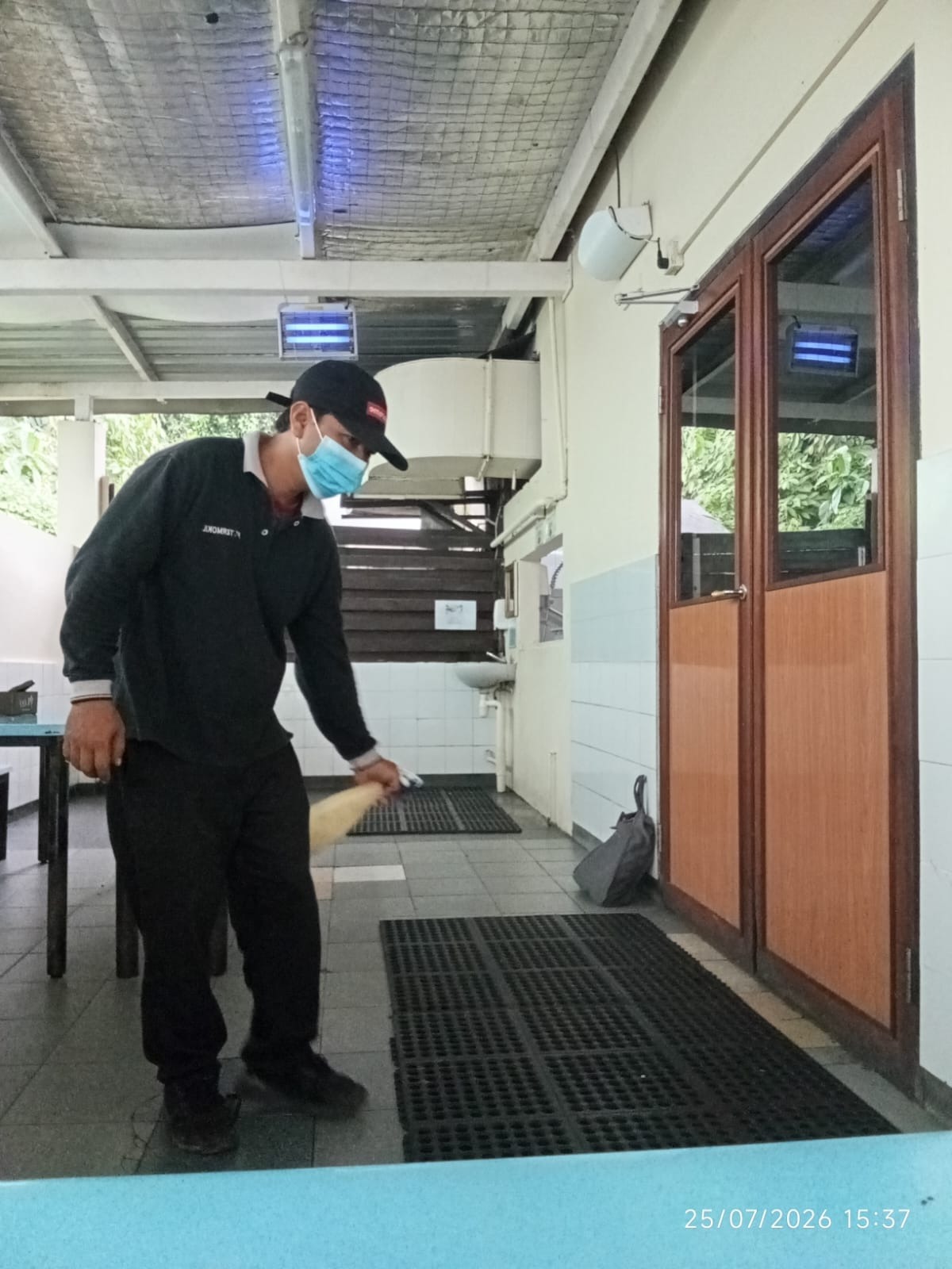 Termokil technician treating a commercial kitchen for pests